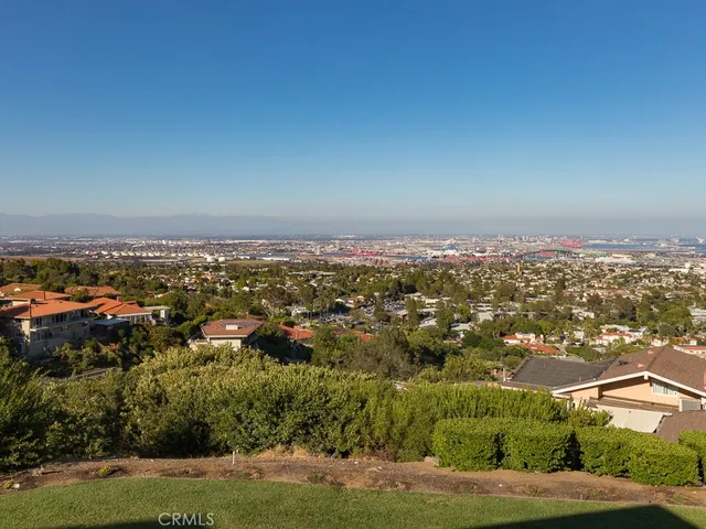 a living room with furniture a couch and a window