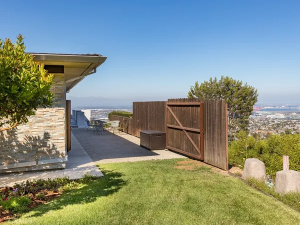 a view of a house with a big yard