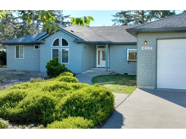 a house view with a garden space