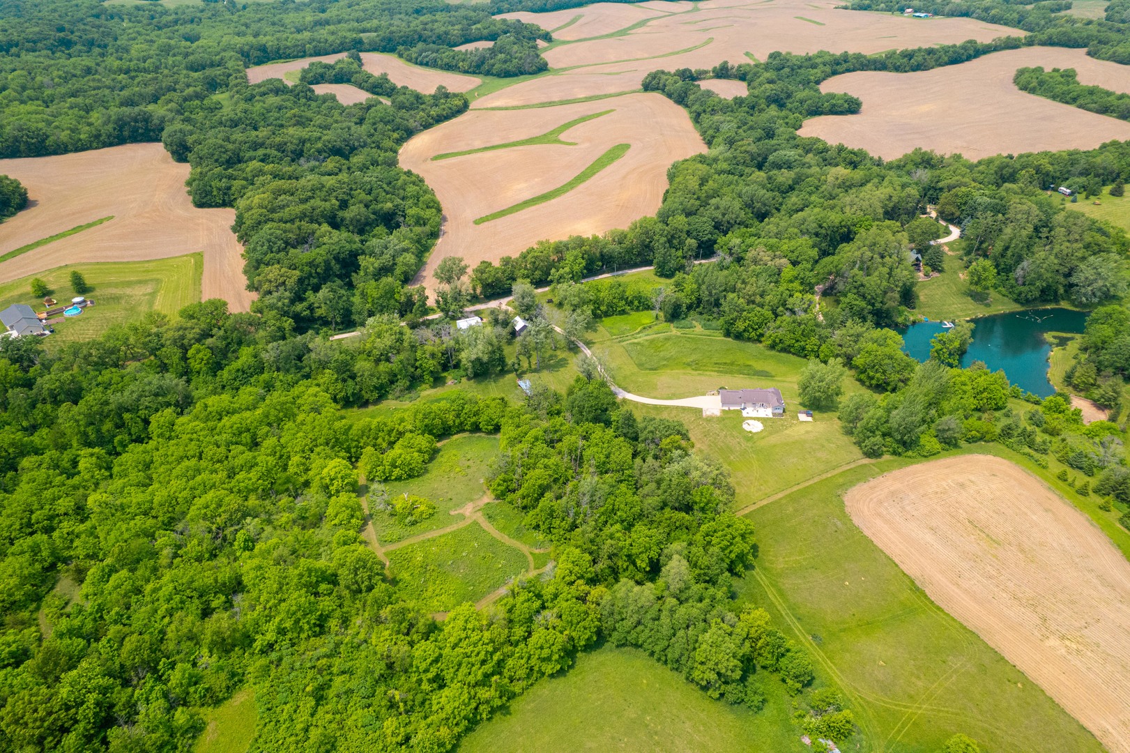 9304 Ellis Road Fenton, IL 61251 - Photo 12 of 81 an aerial view of a residential houses with yard and swimming pool
