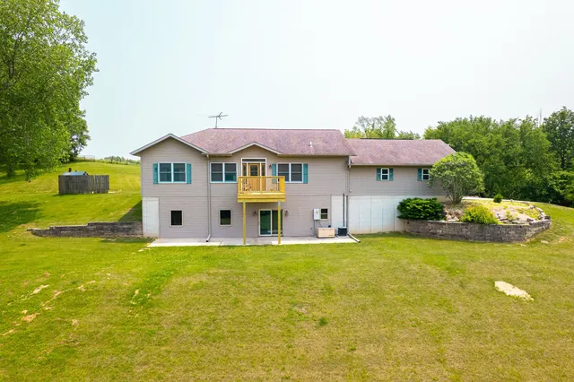 a house view with a garden space