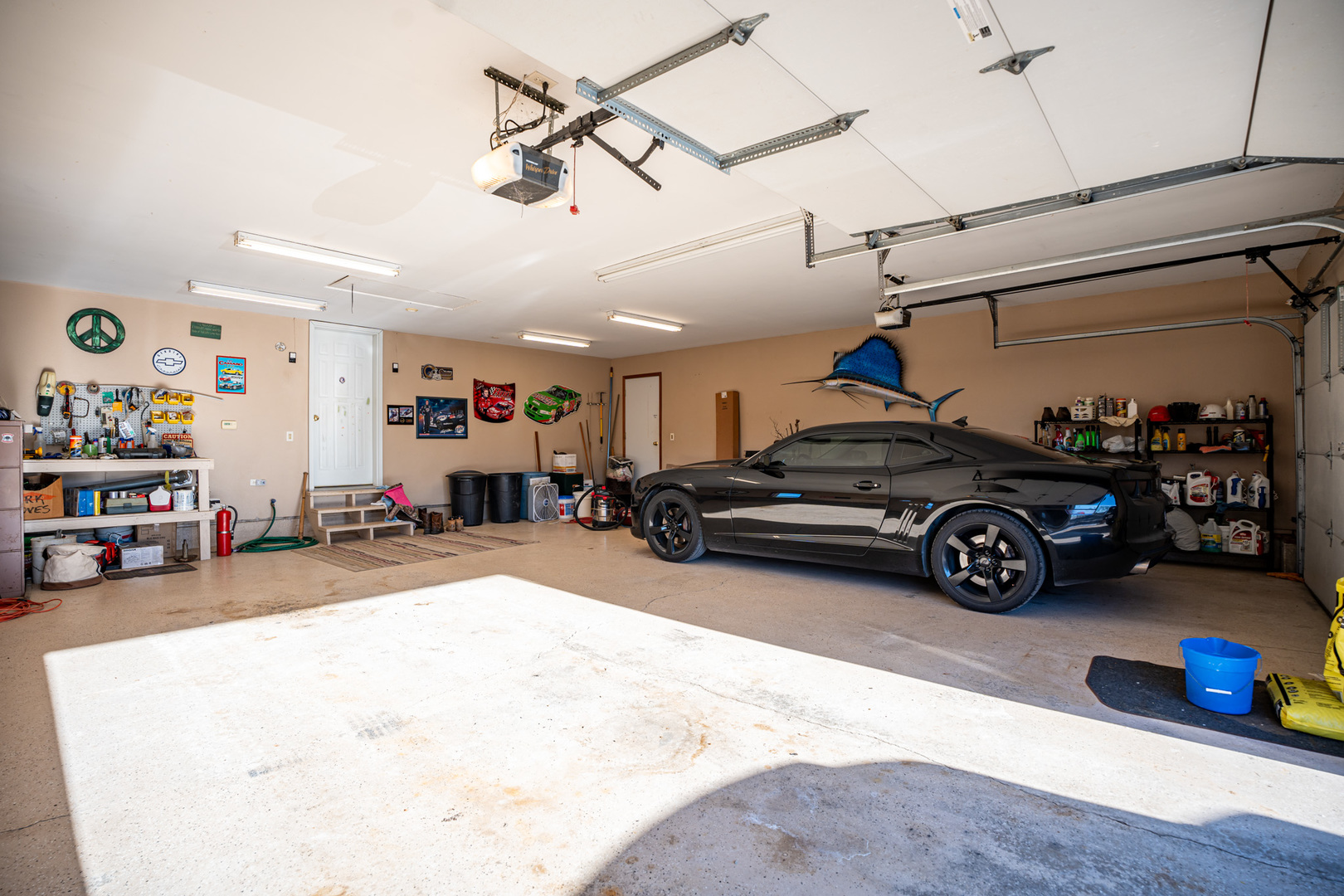 9304 Ellis Road Fenton, IL 61251 - Photo 48 of 81 a view of parking garage with cars parked