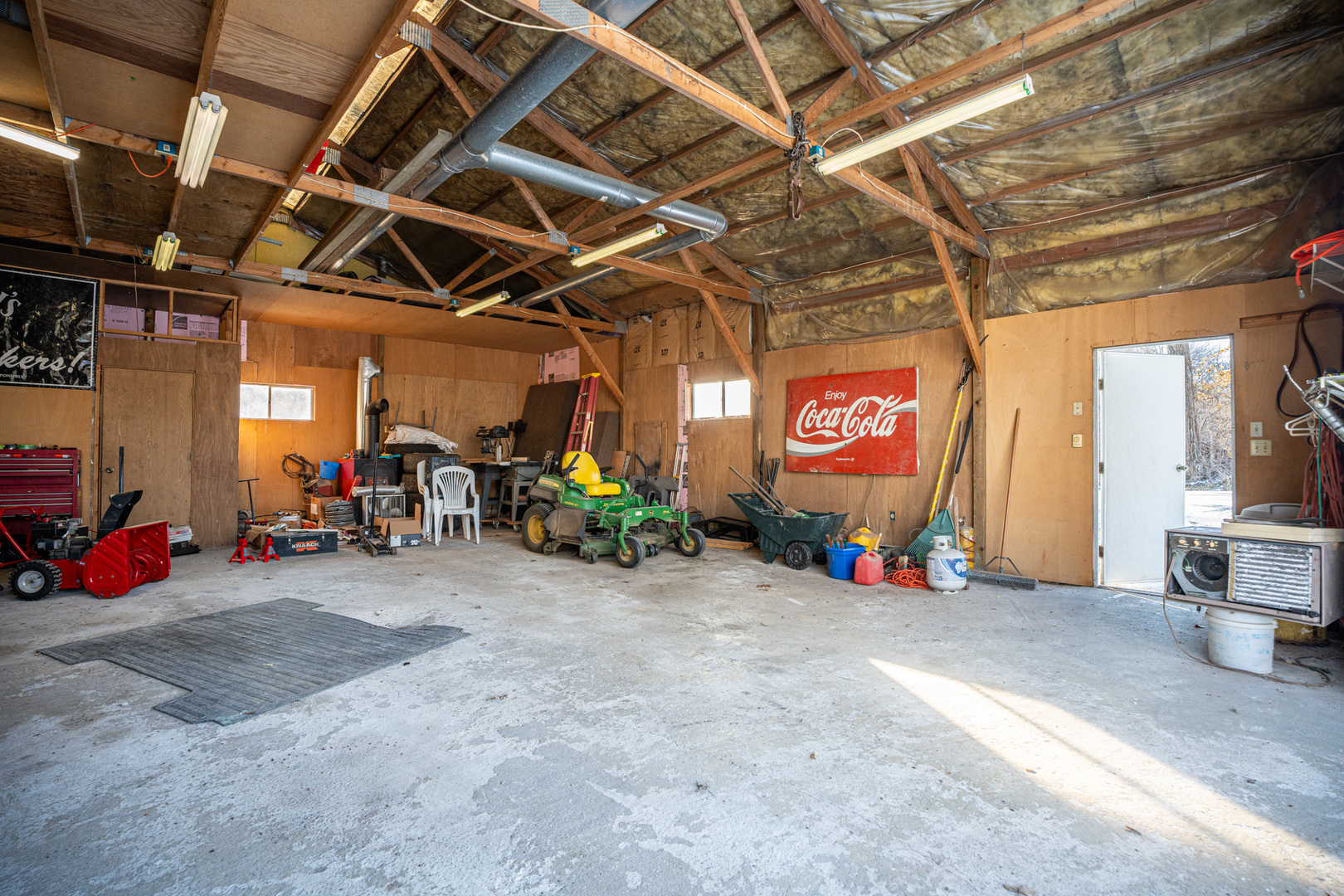 9304 Ellis Road Fenton, IL 61251 - Photo 61 of 81 a view of a garage with a white house