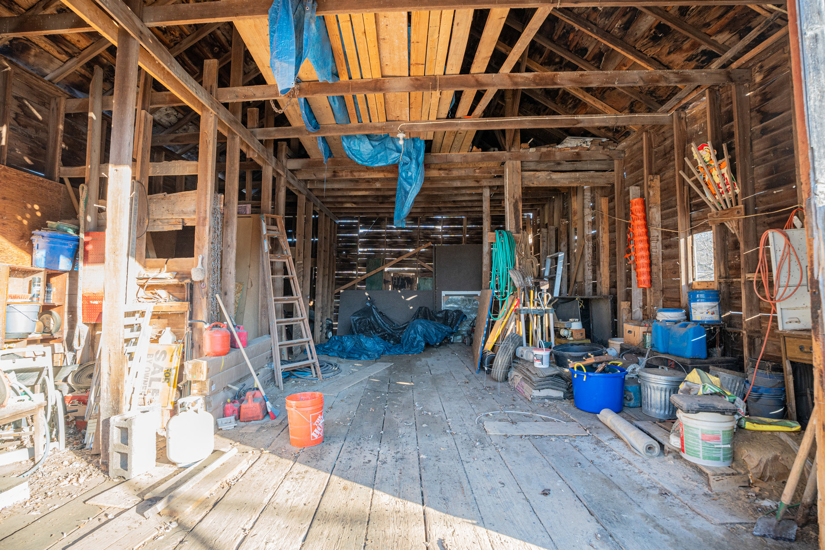 9304 Ellis Road Fenton, IL 61251 - Photo 63 of 81 a view of a storage room with wooden floor