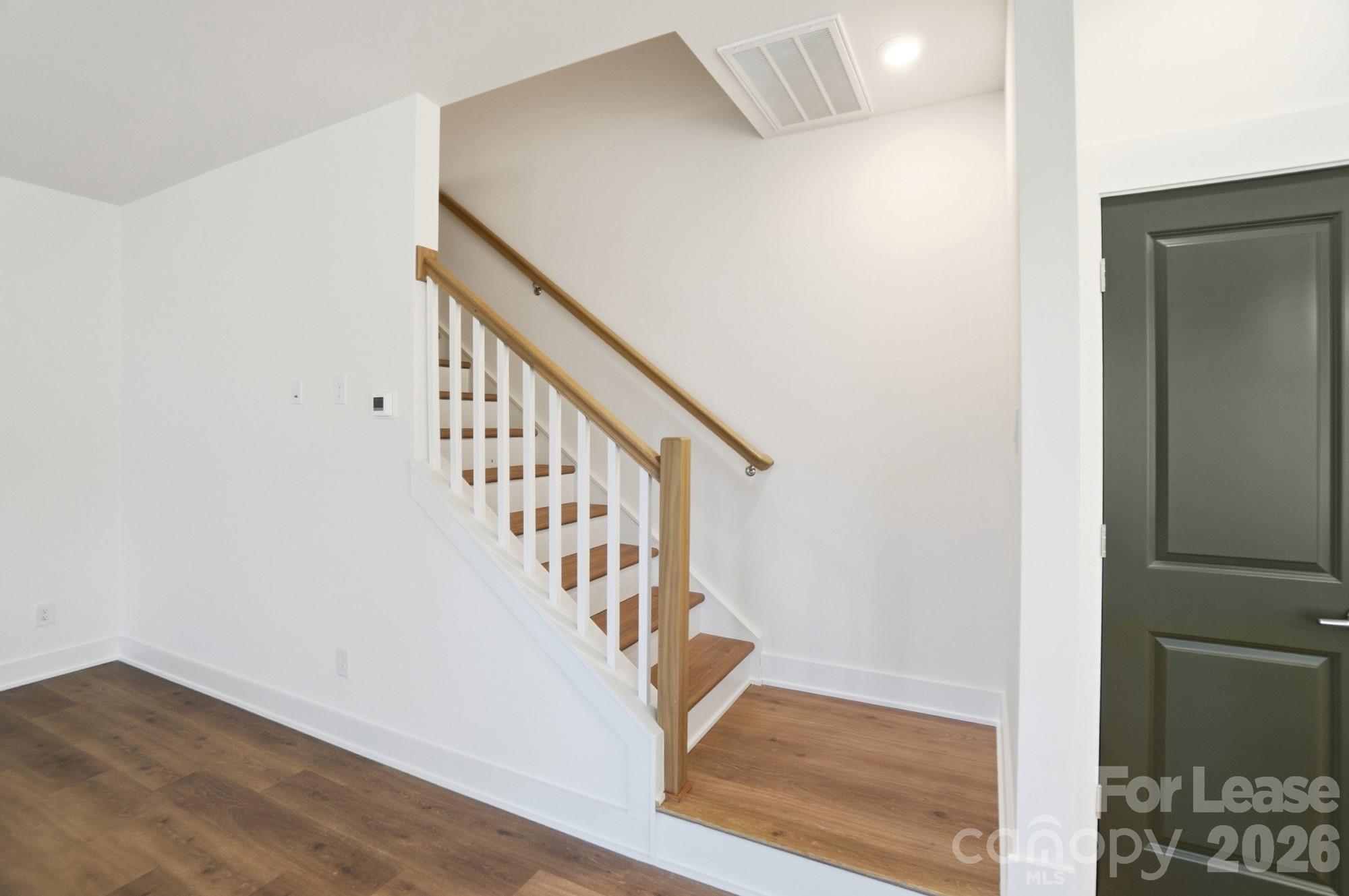 3945 Tillman Road Charlotte, NC 28208 - Photo 21 of 47 a view of entryway with wooden floor