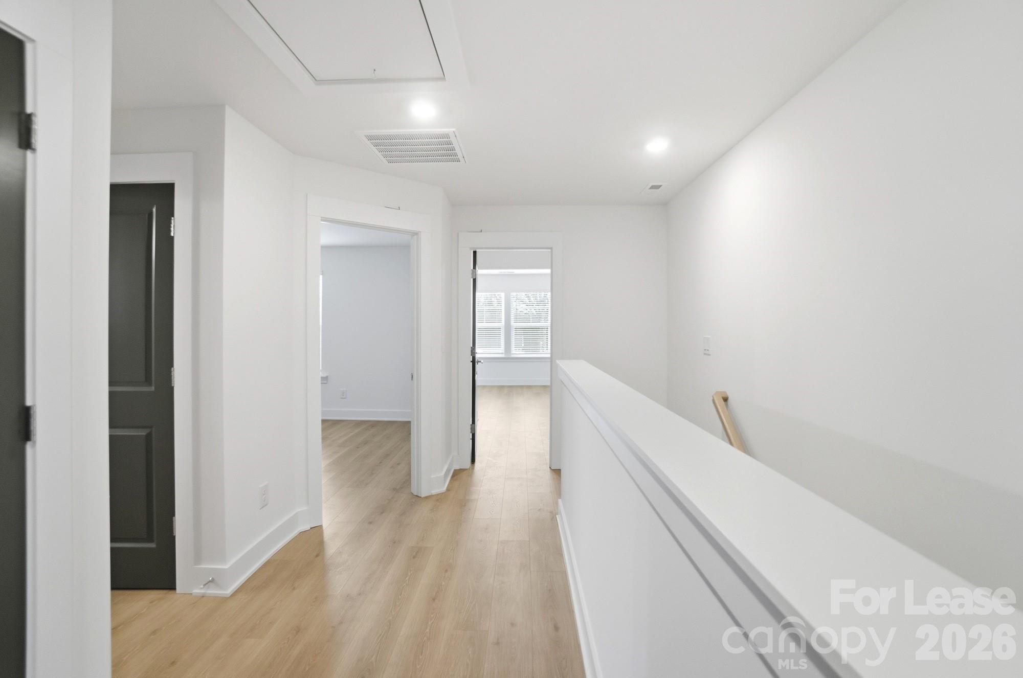 3945 Tillman Road Charlotte, NC 28208 - Photo 22 of 47 a view of hallway with wooden floor