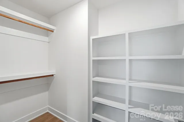 a view of an empty walk in closet