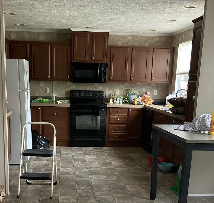168 Liberty Road Winchester, TN 37398 - Photo 3 of 13 a kitchen with a sink stove and refrigerator