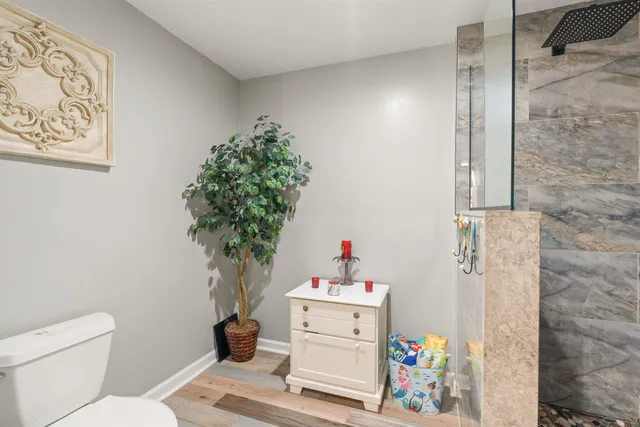 a bathroom with a sink mirror and vanity