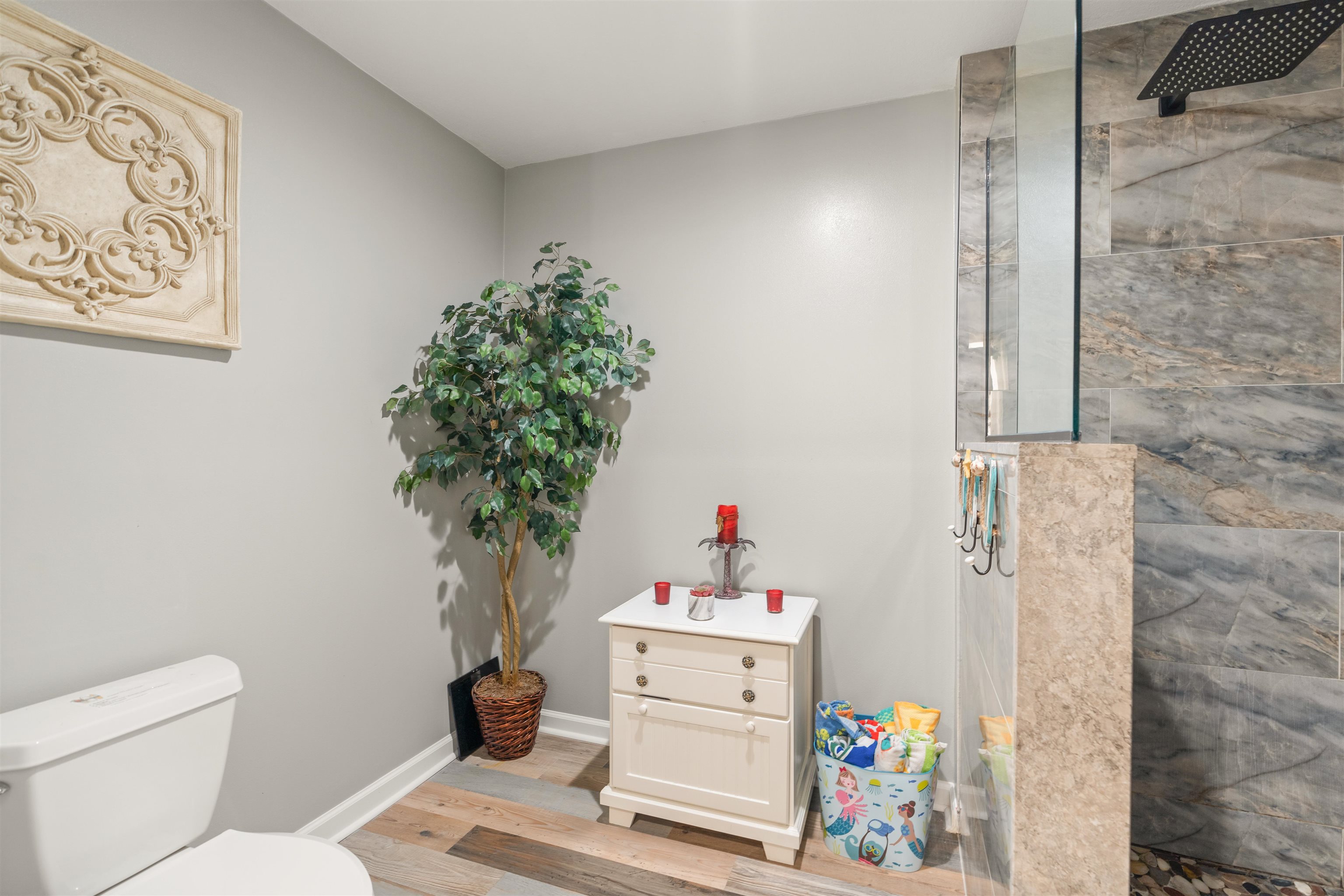 265 Atlantis Circle, Unit 102 St. Augustine Beach, FL 32080 - Photo 17 of 38 a bathroom with a sink mirror and vanity