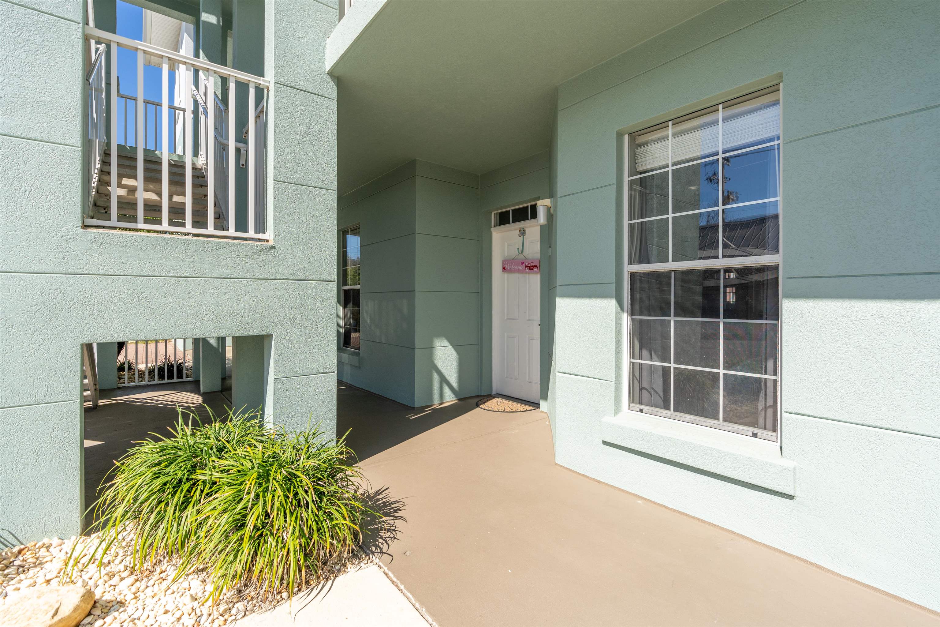 265 Atlantis Circle, Unit 102 St. Augustine Beach, FL 32080 - Photo 20 of 38 a view of front door