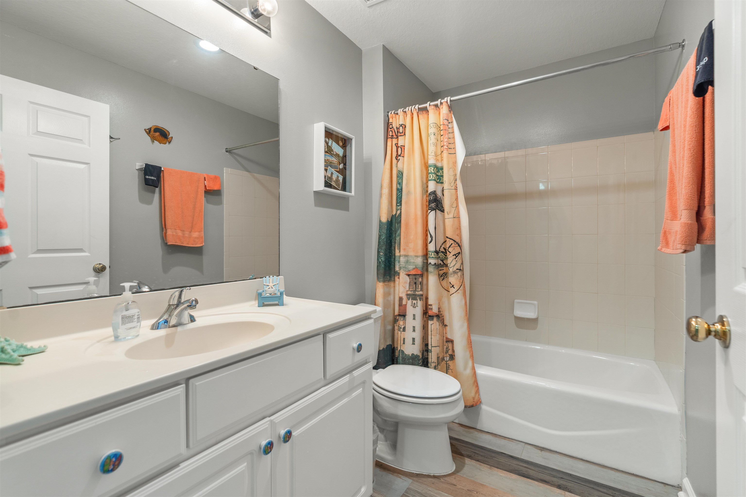 265 Atlantis Circle, Unit 102 St. Augustine Beach, FL 32080 - Photo 25 of 38 a bathroom with a sink toilet and shower
