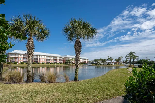 a view of a lake with houses with outdoor space