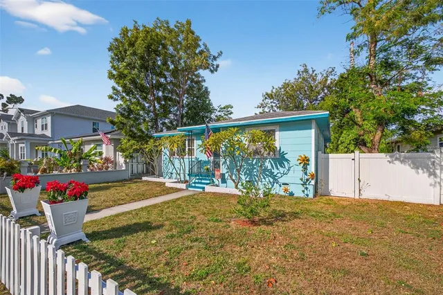 a view of a backyard with garden