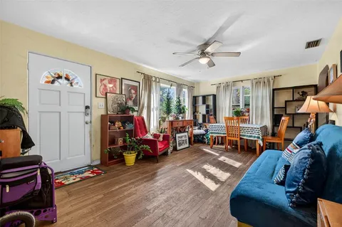 a living room with furniture and a window