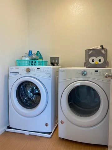 a utility room with dryer and washer