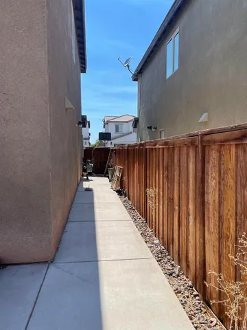 a view of a balcony with wooden floor and a balcony
