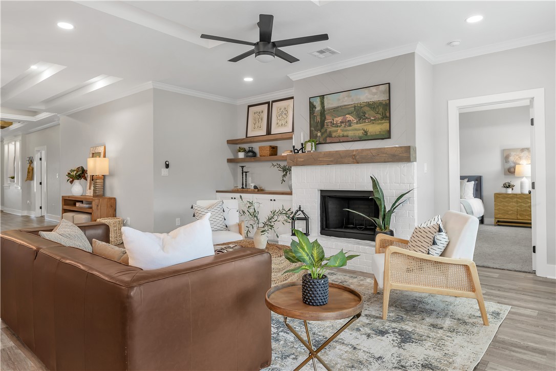 2905 GOLDBERG Drive Bryan, TX 77808 - Photo 14 of 31 a living room with furniture and a fireplace