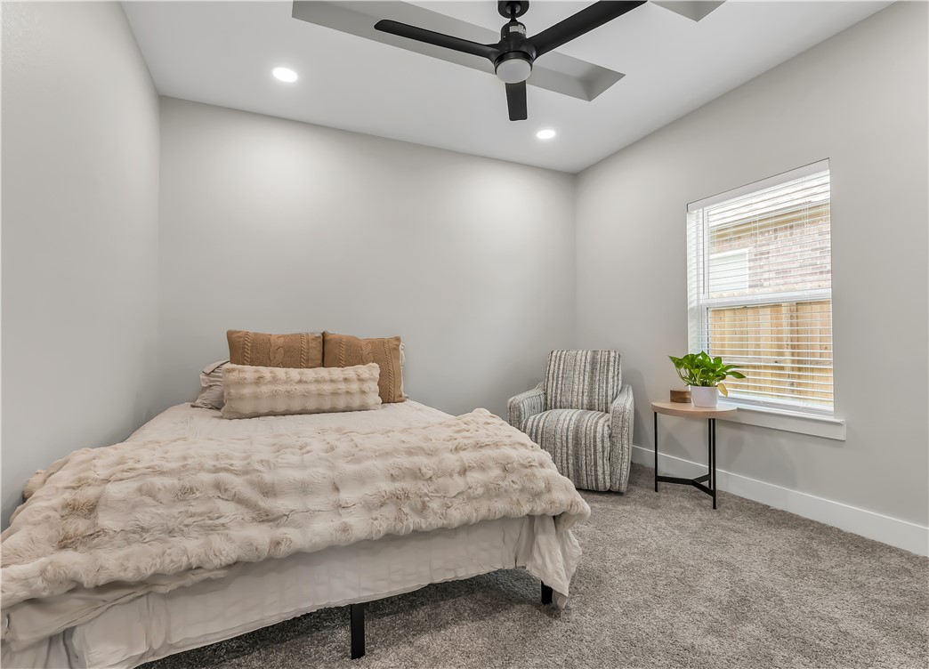 2905 GOLDBERG Drive Bryan, TX 77808 - Photo 26 of 31 a bedroom with a bed furniture and a window