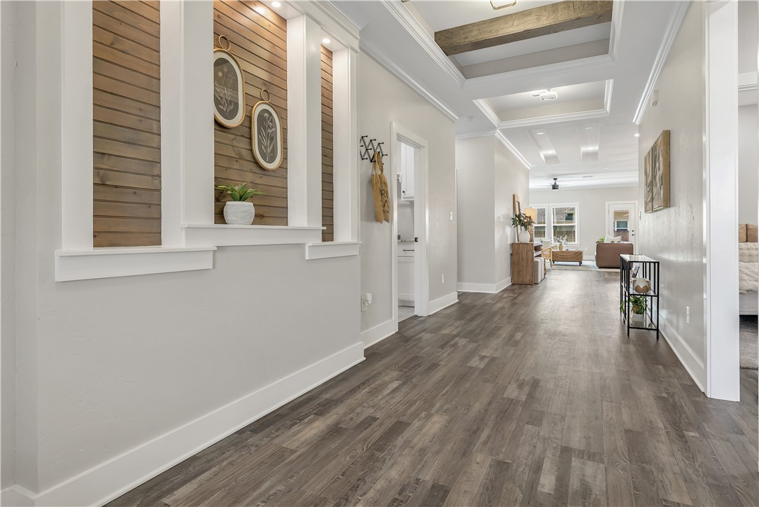 2905 GOLDBERG Drive Bryan, TX 77808 - Photo 3 of 31 a view of a hallway with wooden floor and windows