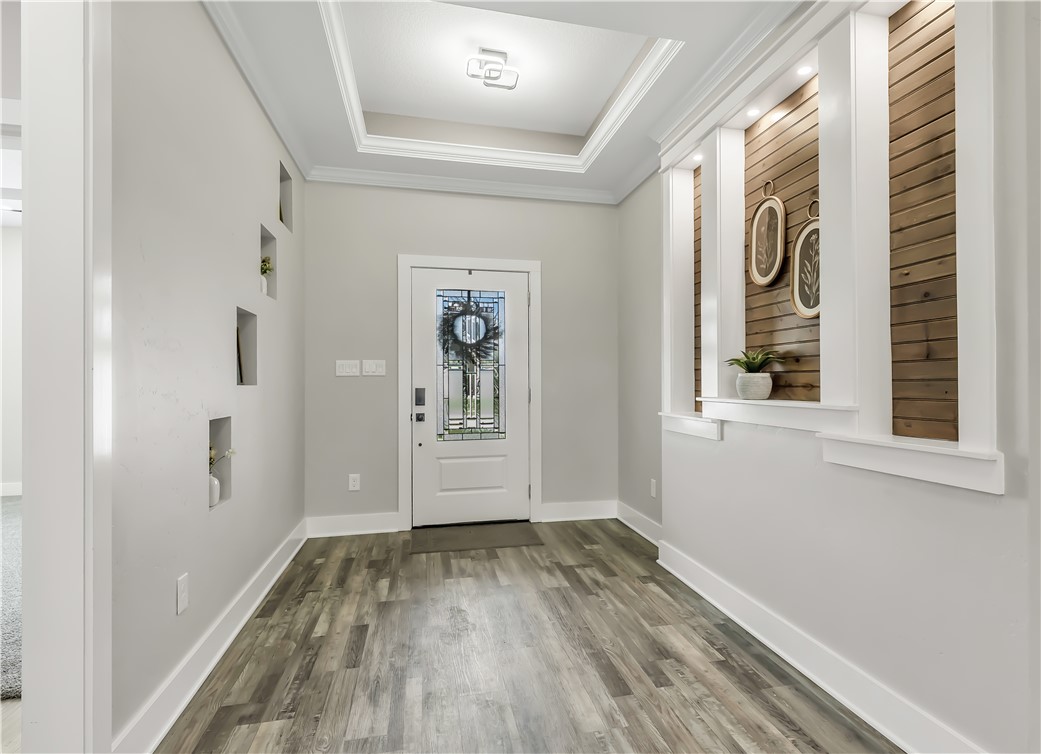 2905 GOLDBERG Drive Bryan, TX 77808 - Photo 4 of 31 a view of front door with wooden floor