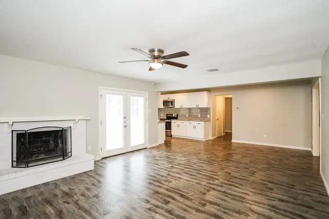 a bathroom with a sink a mirror and a shower
