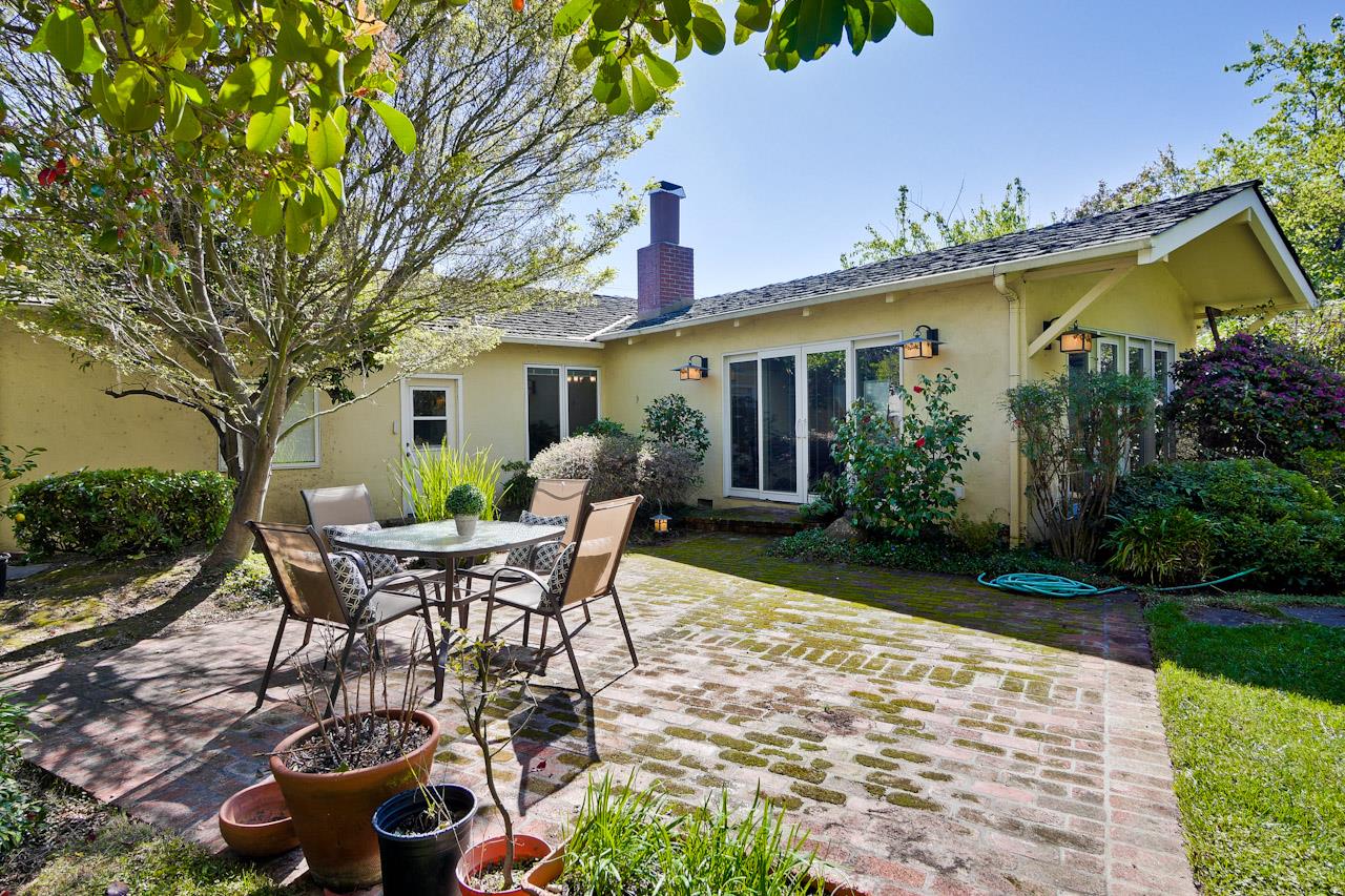 848 Springer Road Los Altos, CA 94024 - Photo 47 of 54 a view of a patio with table and chairs and potted plants