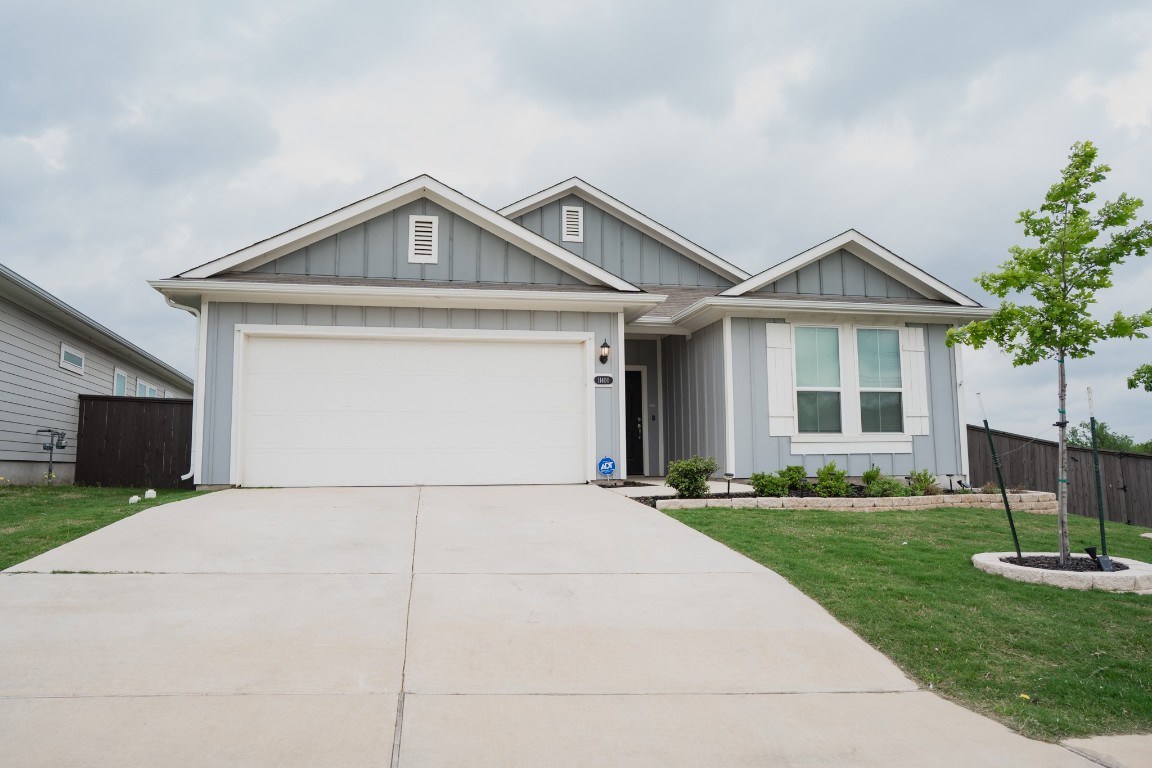 a front view of a house with yard