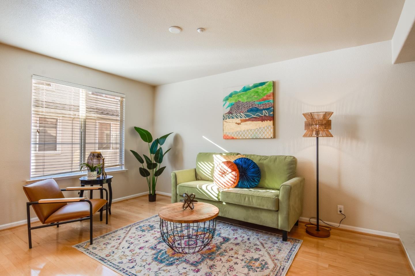 255 Vista Roma Way San Jose, CA 95136 - Photo 13 of 29 a living room with furniture and wooden floor