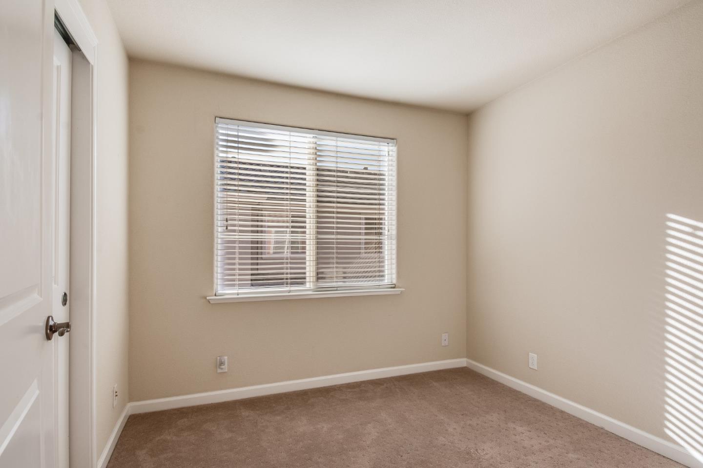255 Vista Roma Way San Jose, CA 95136 - Photo 20 of 29 a view of an empty room with a window