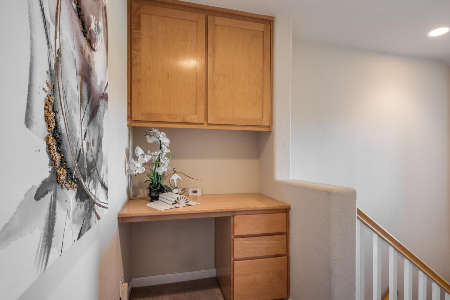 255 Vista Roma Way San Jose, CA 95136 - Photo 21 of 29 a bathroom with a sink and a mirror