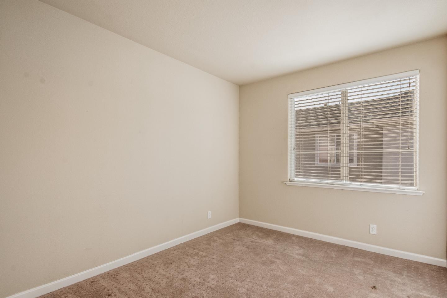 255 Vista Roma Way San Jose, CA 95136 - Photo 23 of 29 a view of an empty room with a window
