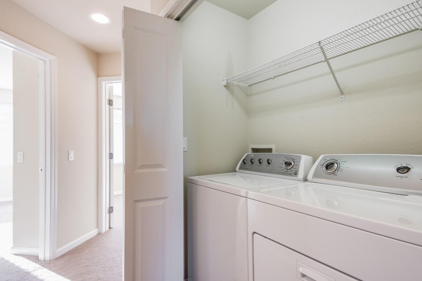 255 Vista Roma Way San Jose, CA 95136 - Photo 24 of 29 a utility room with dryer and washer
