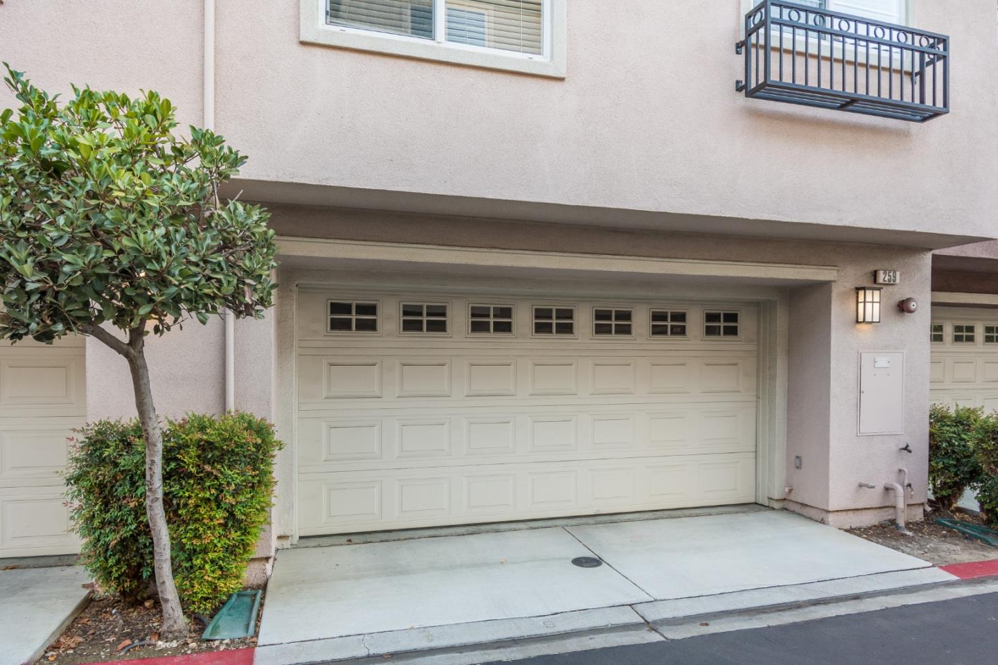 255 Vista Roma Way San Jose, CA 95136 - Photo 27 of 29 a front view of a building with entryway