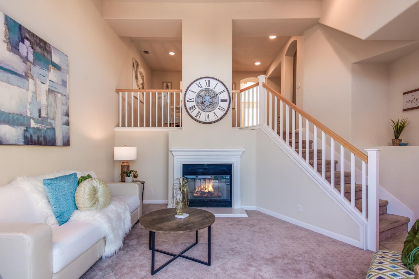 255 Vista Roma Way San Jose, CA 95136 - Photo 6 of 29 a living room with furniture and a fireplace