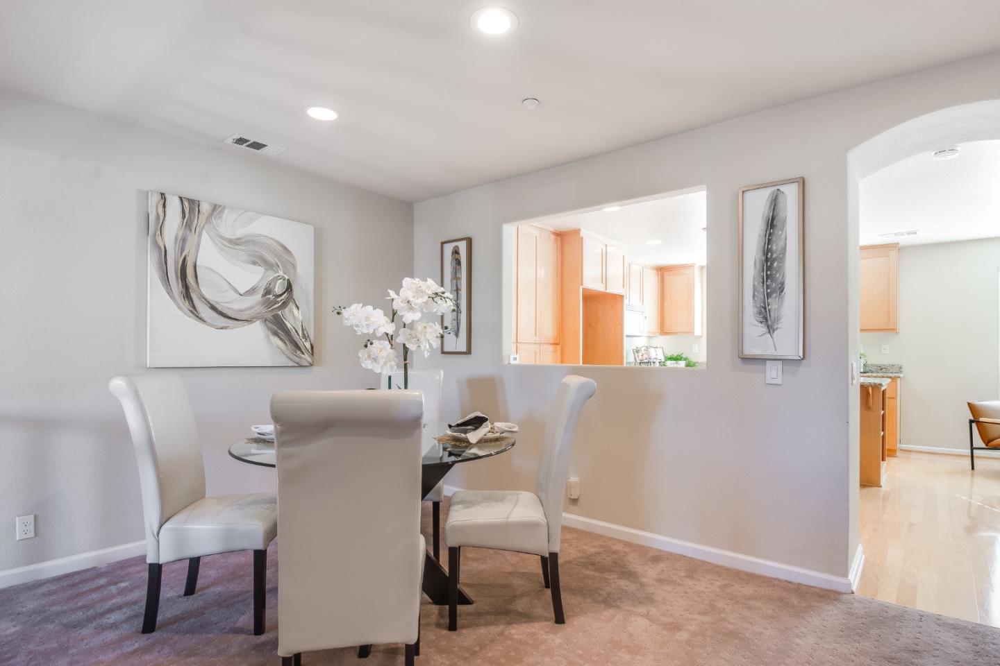 255 Vista Roma Way San Jose, CA 95136 - Photo 8 of 29 a view of a livingroom with furniture and a window