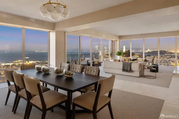 a view of a dining room with furniture window and outside view