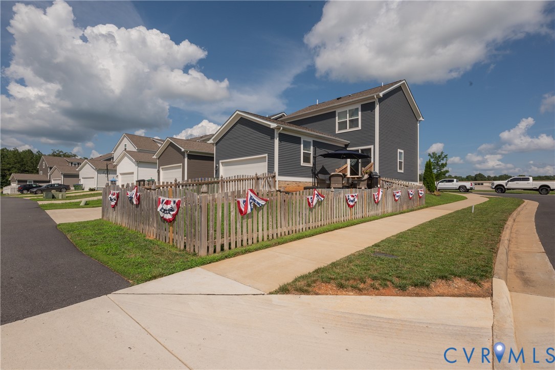 17854 Meriwether Lewis Street Ruther Glen, VA 22546 - Photo 39 of 39 Contemporary townhome with dark gray siding
