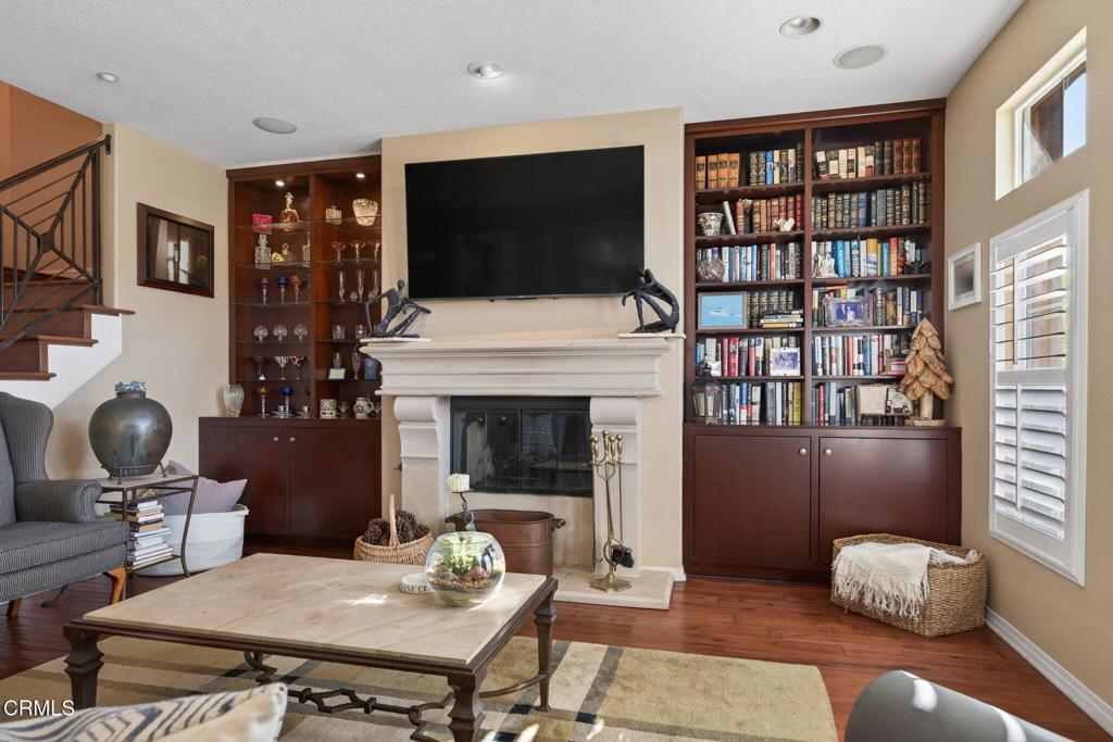 4337 Admiral Way Oxnard, CA 93035 - Photo 13 of 67 a living room with furniture fireplace and flat screen tv
