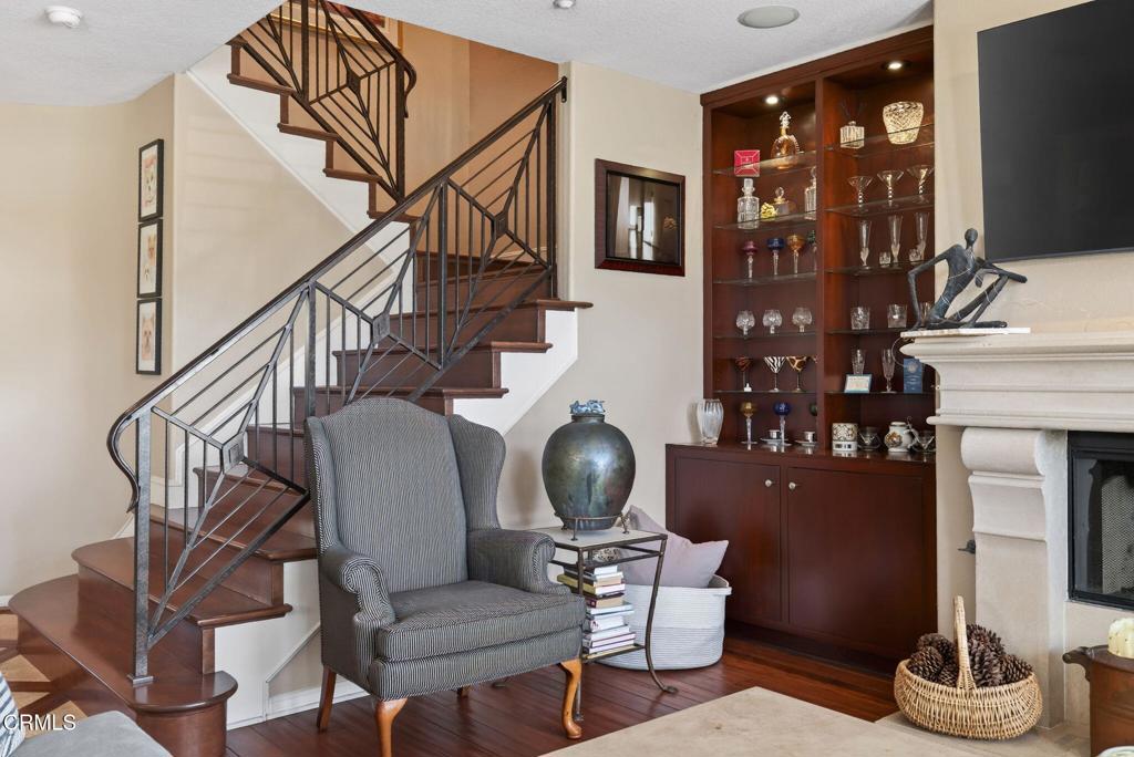 4337 Admiral Way Oxnard, CA 93035 - Photo 14 of 67 a living room with fireplace furniture and a flat screen tv