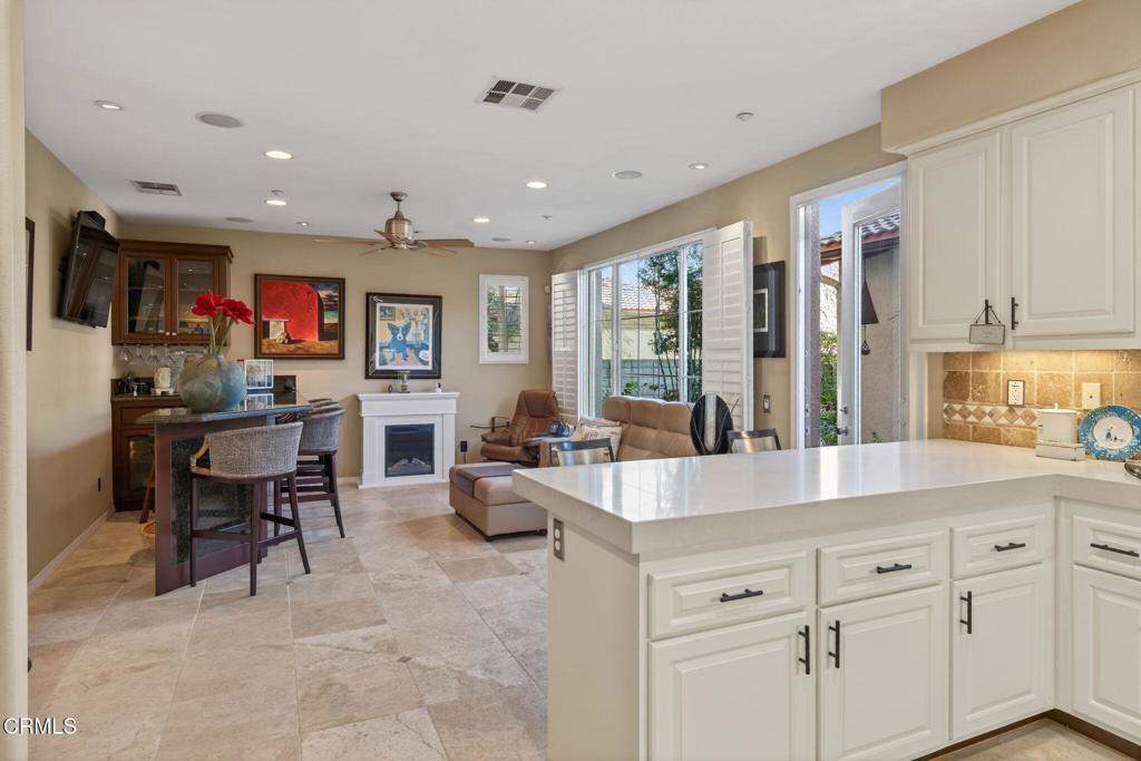 4337 Admiral Way Oxnard, CA 93035 - Photo 19 of 67 a view of living room with granite countertop furniture and a large window