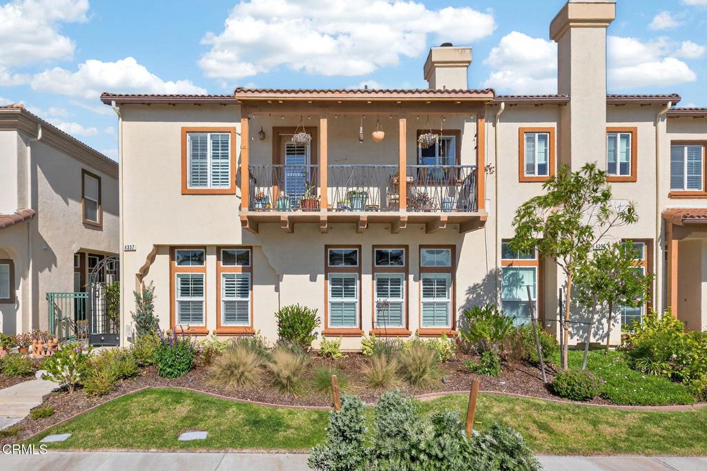 4337 Admiral Way Oxnard, CA 93035 - Photo 2 of 67 a front view of a house with garden