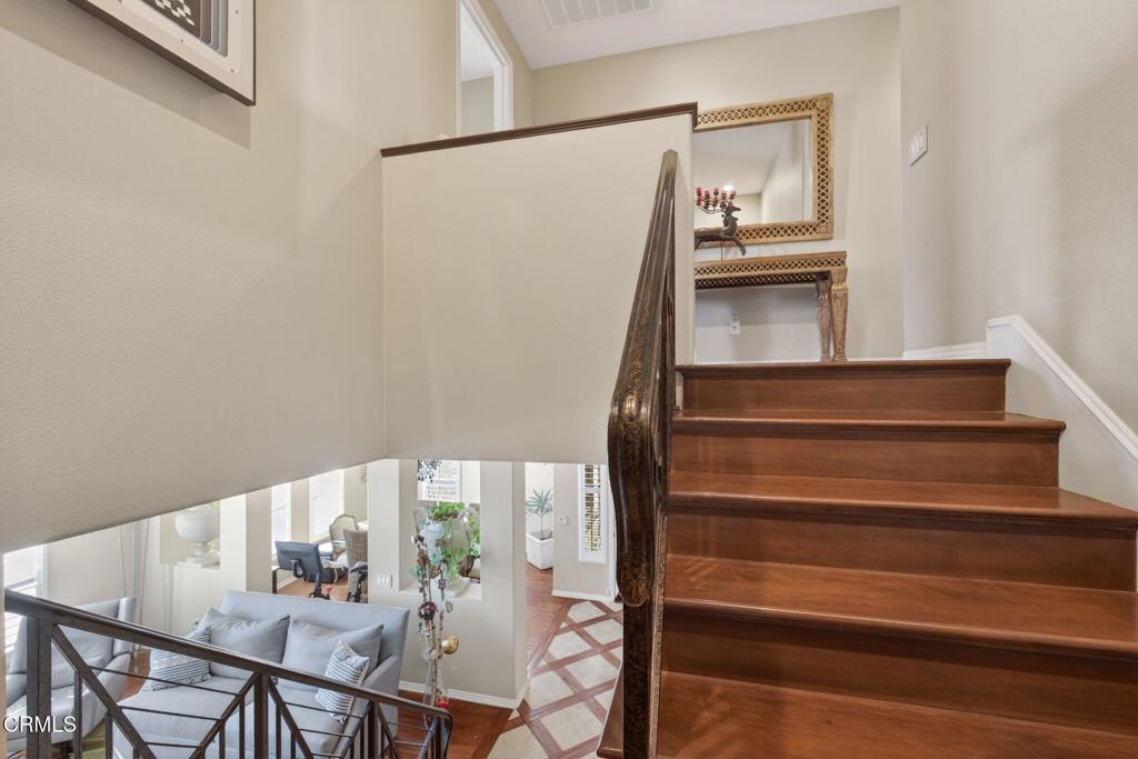 4337 Admiral Way Oxnard, CA 93035 - Photo 24 of 67 a view of entryway and hall with wooden floor