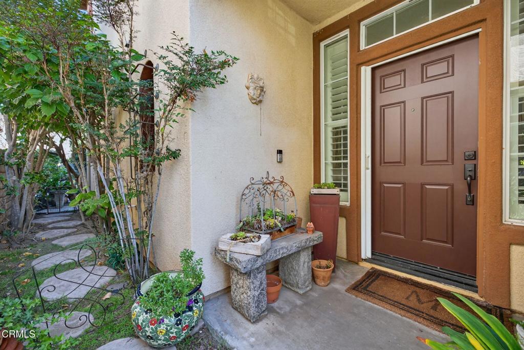 4337 Admiral Way Oxnard, CA 93035 - Photo 4 of 67 a view of a balcony with plants and a potted plant