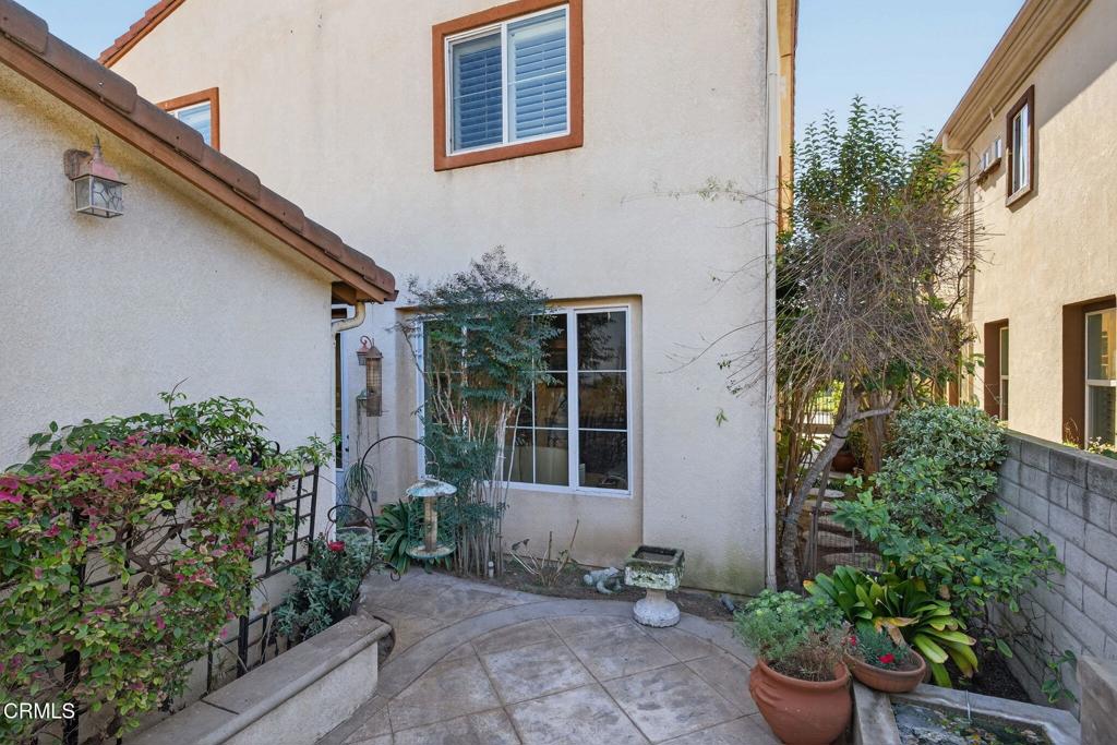 4337 Admiral Way Oxnard, CA 93035 - Photo 51 of 67 a front view of a house with a garden