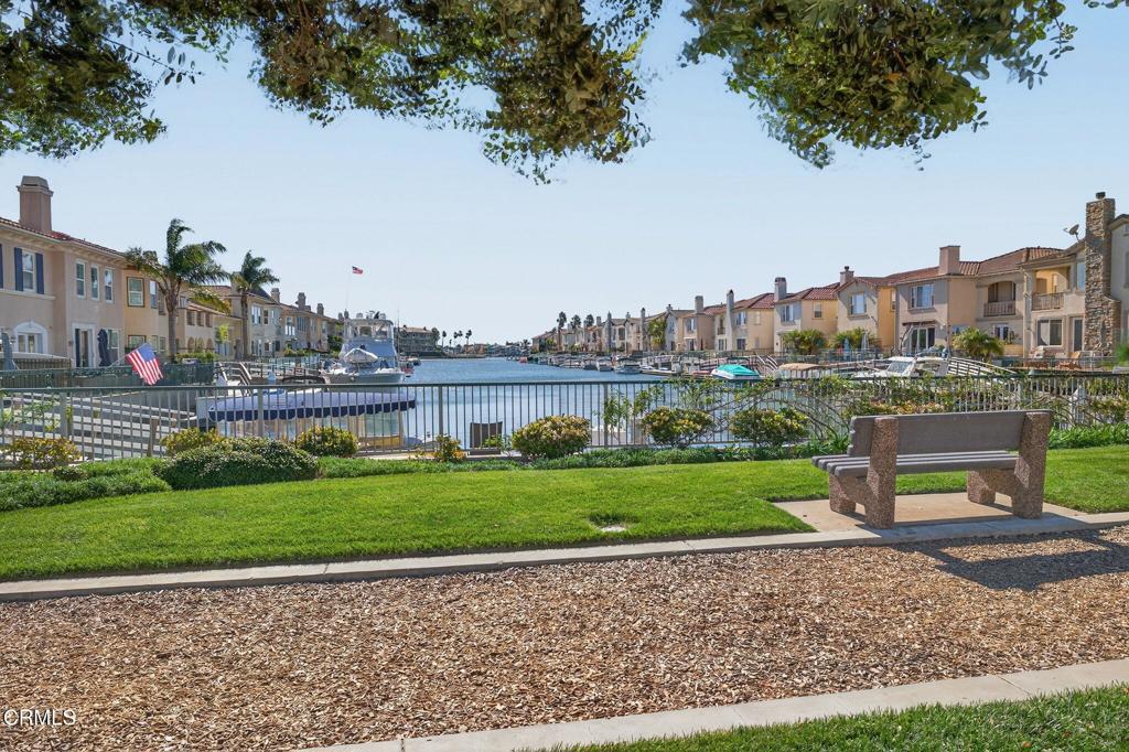 4337 Admiral Way Oxnard, CA 93035 - Photo 54 of 67 a view of a garden with a bench in the background