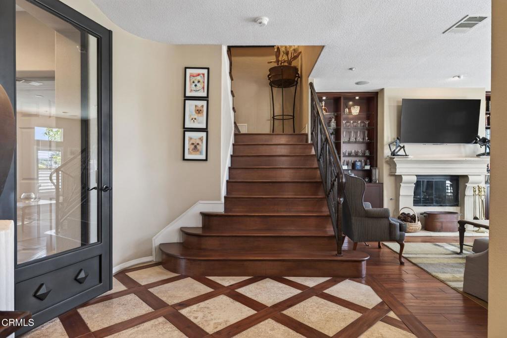 4337 Admiral Way Oxnard, CA 93035 - Photo 6 of 67 a view of entryway and hall with wooden floor
