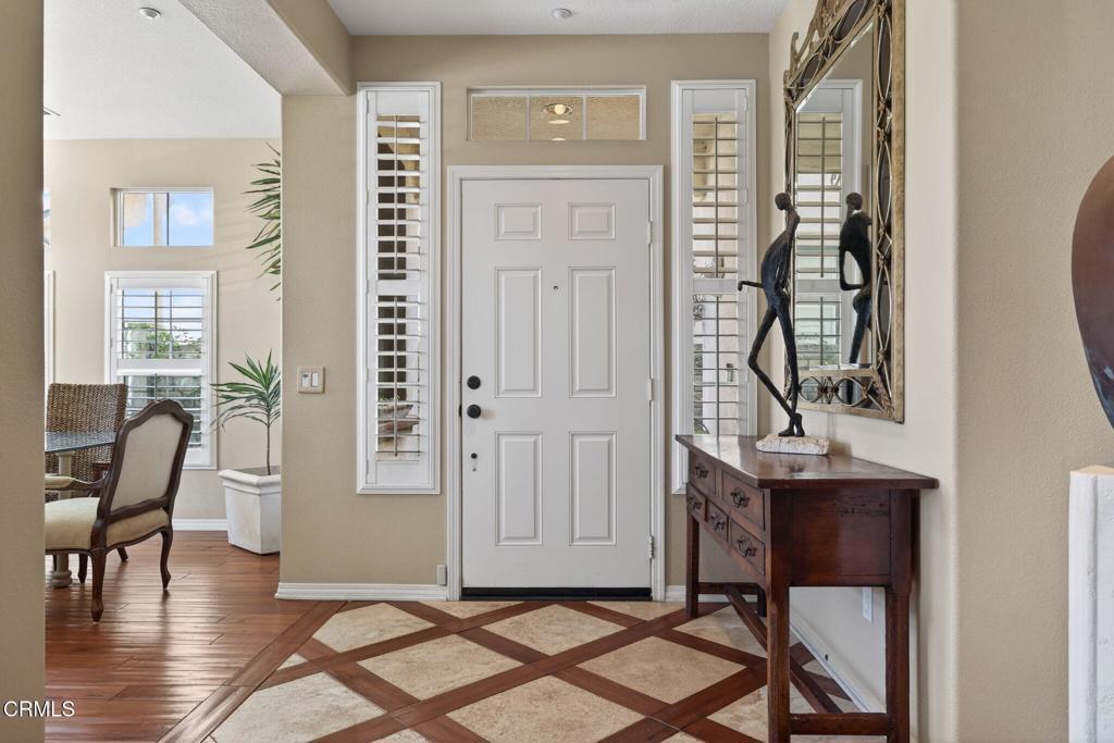 4337 Admiral Way Oxnard, CA 93035 - Photo 7 of 67 a view of a livingroom with furniture and wooden floor