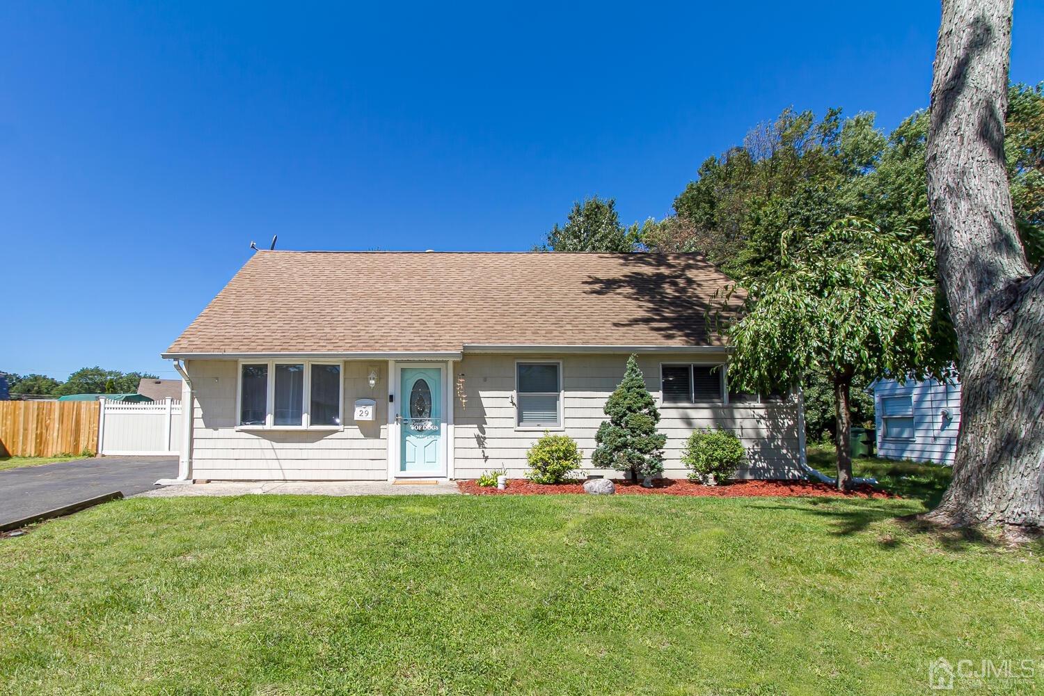 29 Ashley Road Edison, NJ 08817 - Photo 1 of 30 a front view of a house with garden