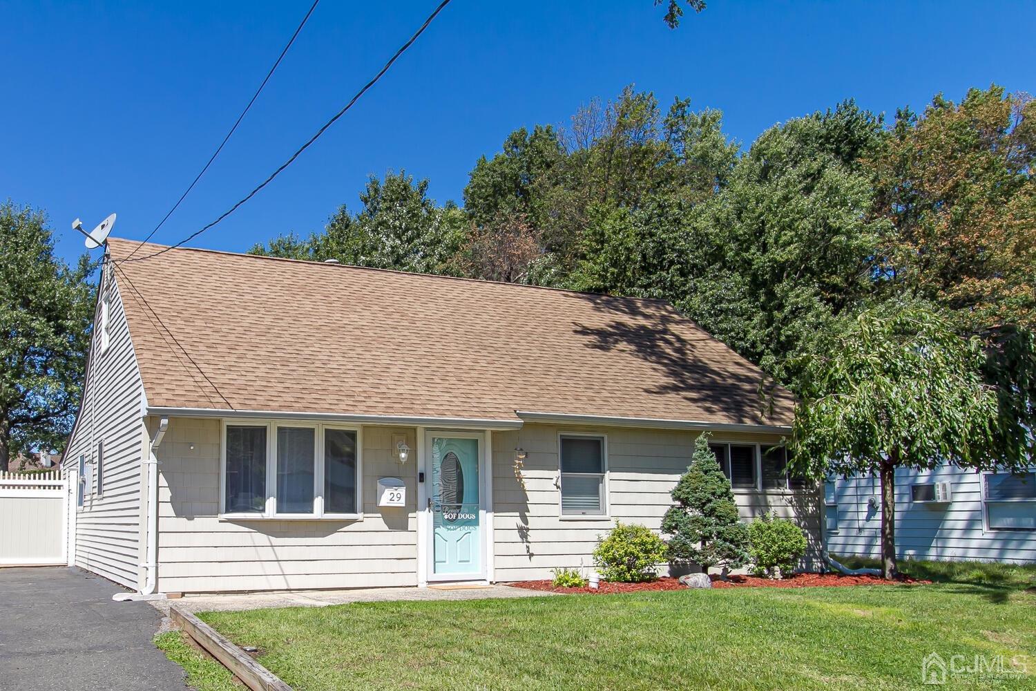 29 Ashley Road Edison, NJ 08817 - Photo 2 of 30 a front view of a house with a yard
